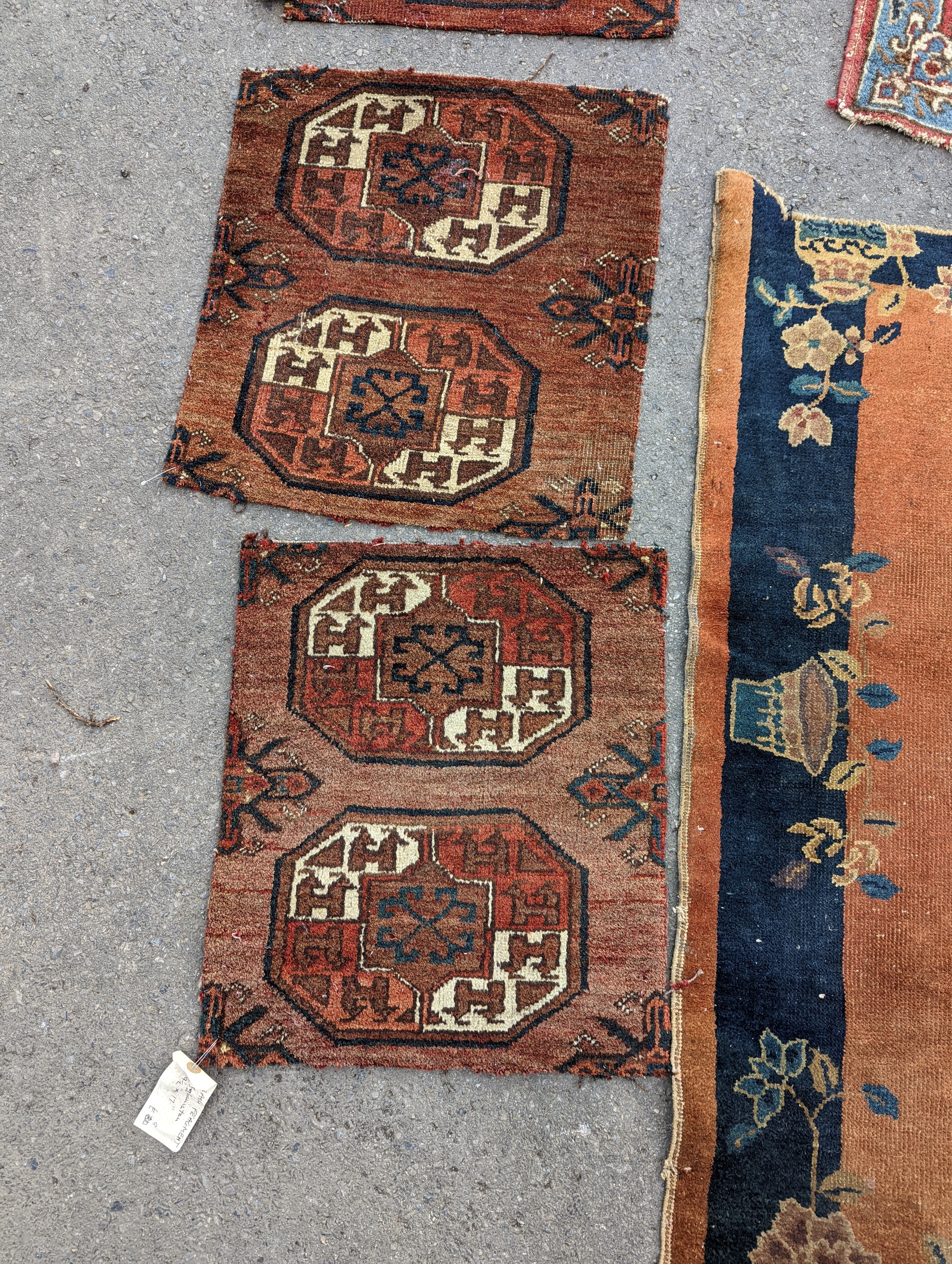 Nine Afghan, Persian and Chinese rug fragments.